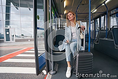 Passenger seated in transport vehicle staring into distance Stock Photo