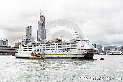 Passenger ship standing in Victoria harbour in Hong Kong. Editorial Stock Photo