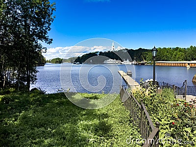 Passenger tourist ship standing at the pier on the island of Valaam Stock Photo