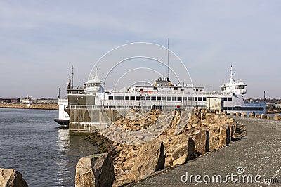 Passenger-vehicle ferry Island Home passing through hurricane barrier Editorial Stock Photo