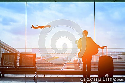 Passenger waiting for flight in airport, departure terminal Stock Photo