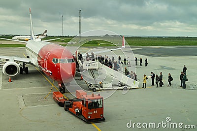 Passengers boarding airplane from Norwegian Airlines Editorial Stock Photo