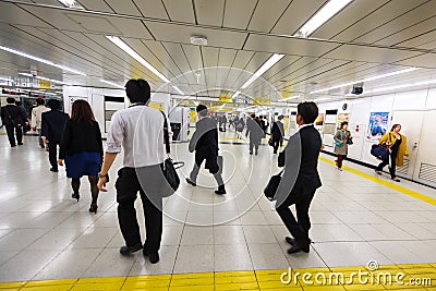 Passengers in hurry at Tokyo subway station Editorial Stock Photo