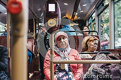 Passengers inside a New Routemaster, London, UK Editorial Stock Photo