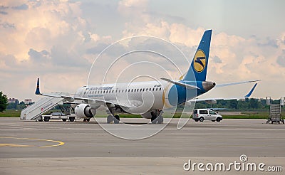 Passengers plane Boeing 737-900ER on the Boryspil airport apron runway. Ukraine International Airlines planes. Editorial Stock Photo