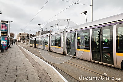 Passengers in a tram station in Dublin, Ireland Editorial Stock Photo