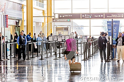 Passengers in the TSA line in an airport Editorial Stock Photo