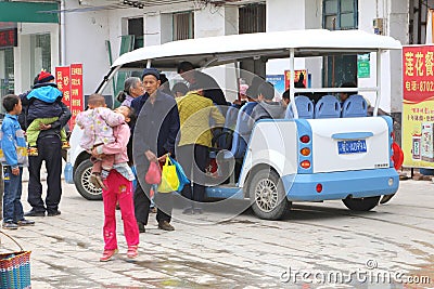 Modern electric plug car taxi for public transport in Guilin,China Editorial Stock Photo