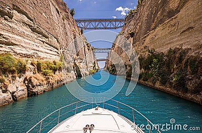 Passing through the Corinth Canal by yacht, Greece. The Corinth Canal connects the Gulf of Corinth with the Saronic Gulf Stock Photo