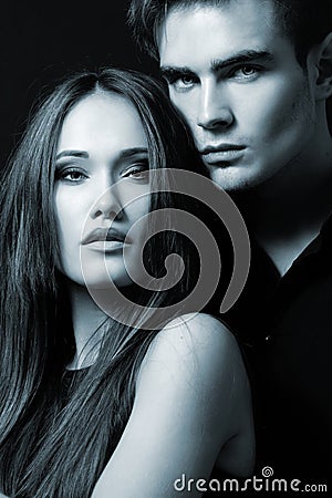 Passion couple, beautiful young female and male faces close Stock Photo