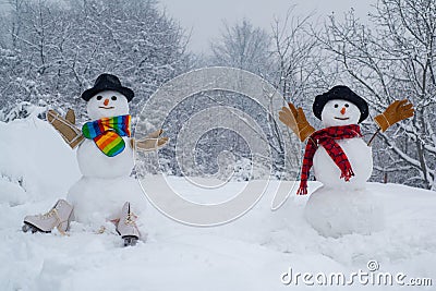 Passion dating and love. Two Snowman on snow background. Winter scene with snowman on white snow background. Sensual Stock Photo