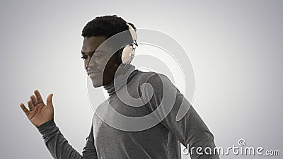 Passionate African american man listening to the music in headph Stock Photo