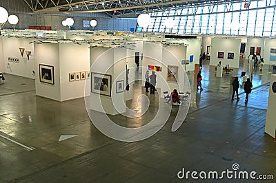 Passionate collectors and emerging artists meet at the international contemporary art fair `Artissima` Turin Italy Editorial Stock Photo