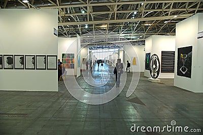 Passionate collectors and emerging artists meet at the international contemporary art fair `Artissima` wearing mandatory face mask Editorial Stock Photo