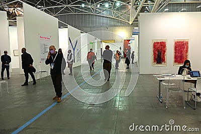 Passionate collectors and emerging artists meet at the international contemporary art fair `Artissima` wearing mandatory face mask Editorial Stock Photo