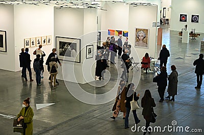 Passionate collectors and emerging artists meet at the international contemporary art fair `Artissima` wearing mandatory face mask Editorial Stock Photo