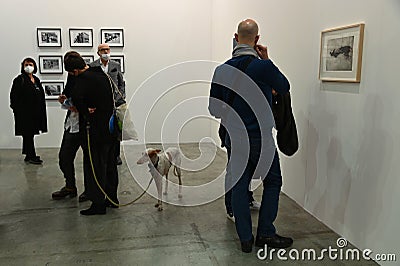 Passionate collectors and emerging artists meet at the international contemporary art fair `Artissima` wearing mandatory face mask Editorial Stock Photo