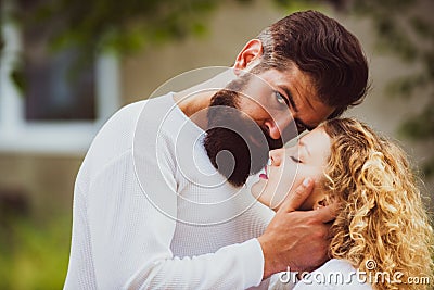 Passionate love. Couple in retro old style. Beautiful young couple waiting to kiss. Passionate man gently kissing Stock Photo