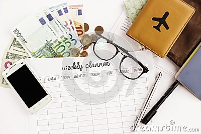 passport money phone with empty screen weekly planner map and glasses on white background, visa or insurance papers, travel Stock Photo