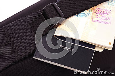 Passports and black bag Stock Photo