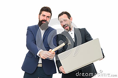 Password hack. Businessmen break or hack computer. Hackers hold laptop and hammer. Computer hacking. Hack in company Stock Photo