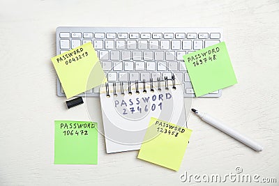 Password message written on sticky notes in computer keyboard Stock Photo