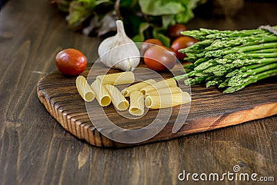 Pasta, asparagus and other vegetables Stock Photo