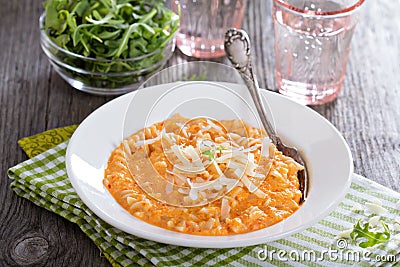 Pasta in cheesy roasted bell peppers sauce Stock Photo