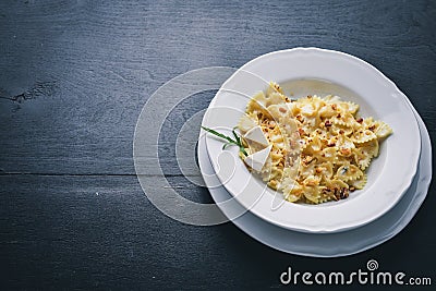 Pasta four cheeses. Italian food. On a wooden background Stock Photo