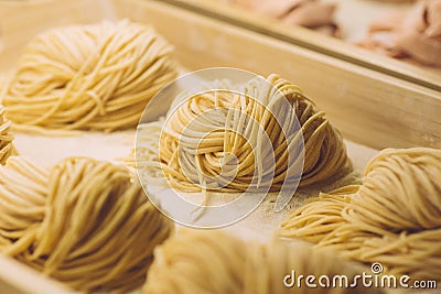 Pasta fresh italian spaghetti in classic style on white background. Homemade cooking Stock Photo