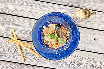 Pasta Frutti di Mare with side dish, top view. Stock Photo
