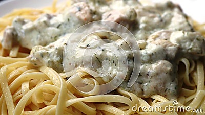 Pasta with meat in milk gravy Stock Photo