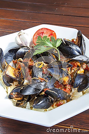 Pasta with Mediterranean mussels Stock Photo