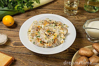 Pasta with mushrooms, white wine and leeks. Close up. Stock Photo