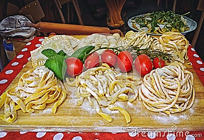 Pasta , pizza and homemade food arrangement outside a restaurant in Rome Stock Photo