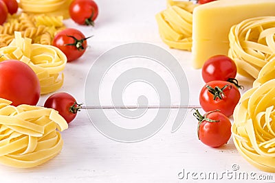 Pasta Products with Tomato Cheese Raw Pasta Fusili Fettuccine Ingredients Italian Food White Background Close Up Copy Space Frame Stock Photo