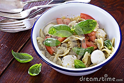 Pasta salad Caprese style with farfalle Stock Photo