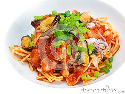 Pasta with shrimps, herbs and mashrooms Stock Photo