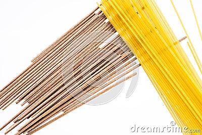 Pasta, spaghetti, shells, rings, bows on a black or white background top view Stock Photo
