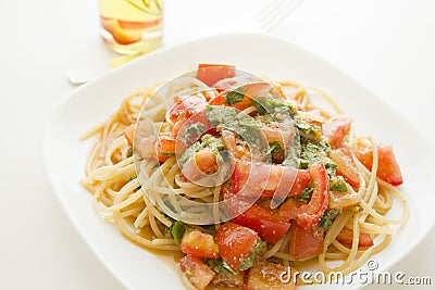 The pasta of a tomato and a green perilla Stock Photo