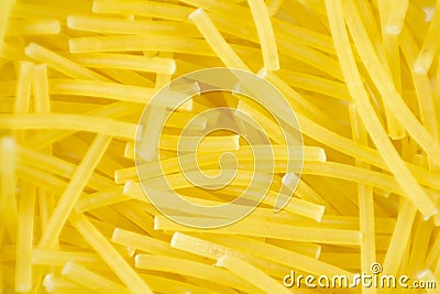 Pasta. Yellow vermicelli. Close up. Macro shot Stock Photo