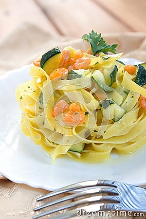 Pasta zucchini and shrimp Stock Photo