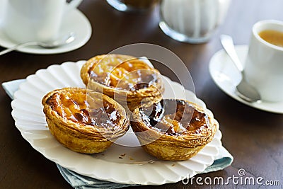 Pasteis de Nata or Portuguese Custard Tarts in Cafe Stock Photo