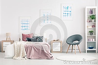 Pastel bedroom interior with armchair Stock Photo