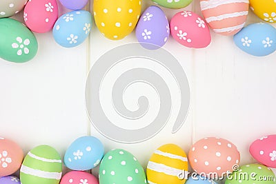 Pastel Easter Egg double border against a white wood background Stock Photo