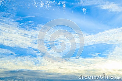 Pastel fluffy blue sky background with some clouds. Meteorology concept Stock Photo