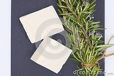 bars of natural artisan soap with rosemary essence, solid and natural soap isolated on white background Stock Photo