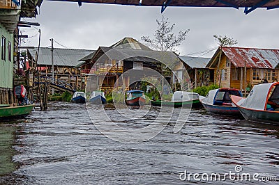 PASTO, COLOMBIA - JULY 3, 2016: some small houses located on the shore of la cocha lake Editorial Stock Photo