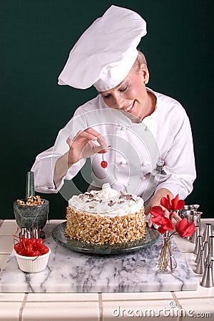 Pastry Chef Spotting Cherry Royalty Free Stock Photos 