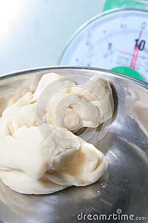 Pastry dough on scale Stock Photo